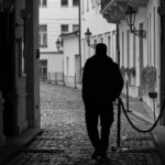 silhouette of lonely man on the street
