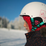 Little girl in a ski helmet
