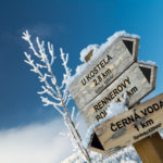 Tourist Signs On Trail In Mountains