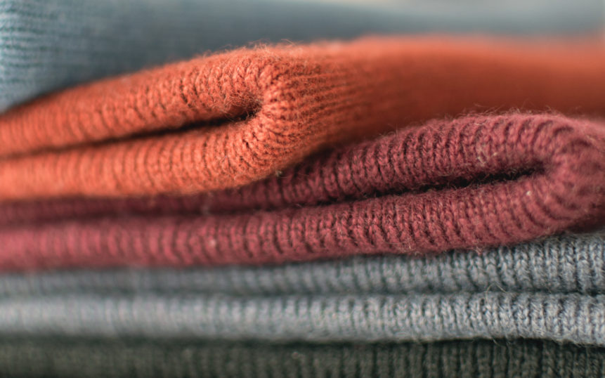 Stack of Cozy Knitted Sweaters
