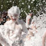 Children have fun in foam