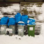 Dustbins covered with snow