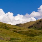 Landscape of the green hills with cloudscape