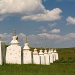Buddhist stupas in Mongolian green steppe