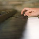 Children's Hands Are Playing The Piano
