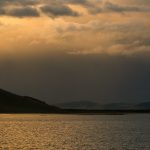 Evening Lake with a Mountain in the Background Evening lake with mountain in background
