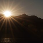 Sunset Sun Rays Over Mountains Sunset sun rays over mountains