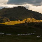 Yurts Under Mountains in Mongolia Yurts under mountains in Mongolia