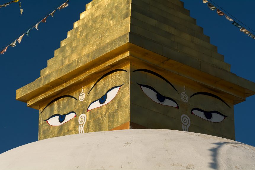 Golden stupa with Buddha eyes