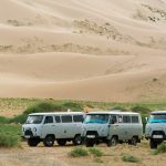UAZ vans on sand dunes