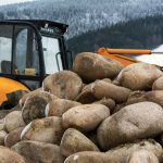 Excavator and Big Stones Excavator and big stones