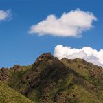 Mountain and blue sky with clouds