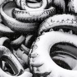 Pile of Old Tires Covered with Snow Pile of old tires covered with snow