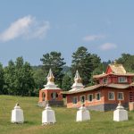 A small Buddhist temple in the meadow