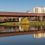 Subway tube bridge over the city pond