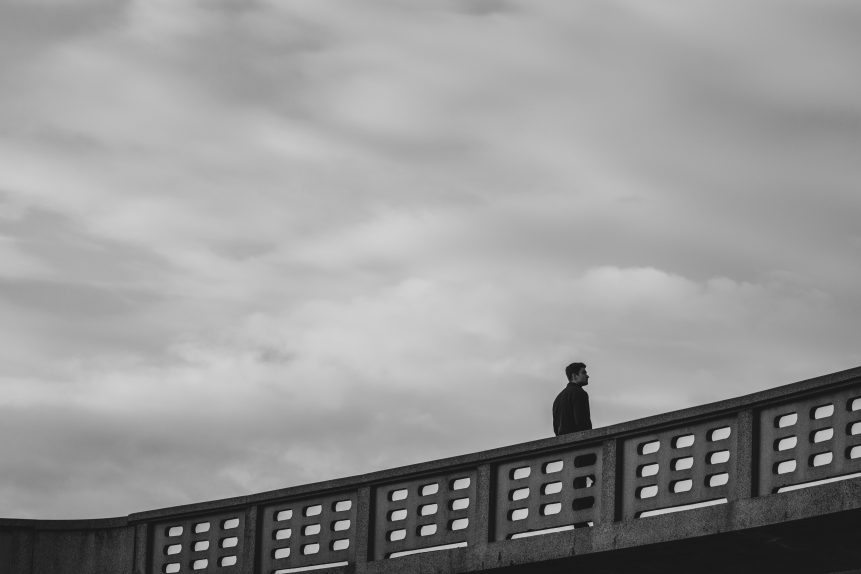 Lonely man on the bridge