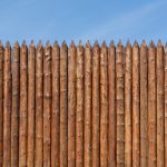 The wall made of vertical logs