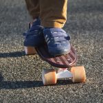 Children on a Penny Board