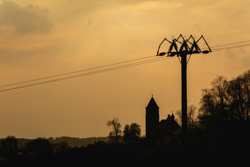 Silhouette of the church and power lines